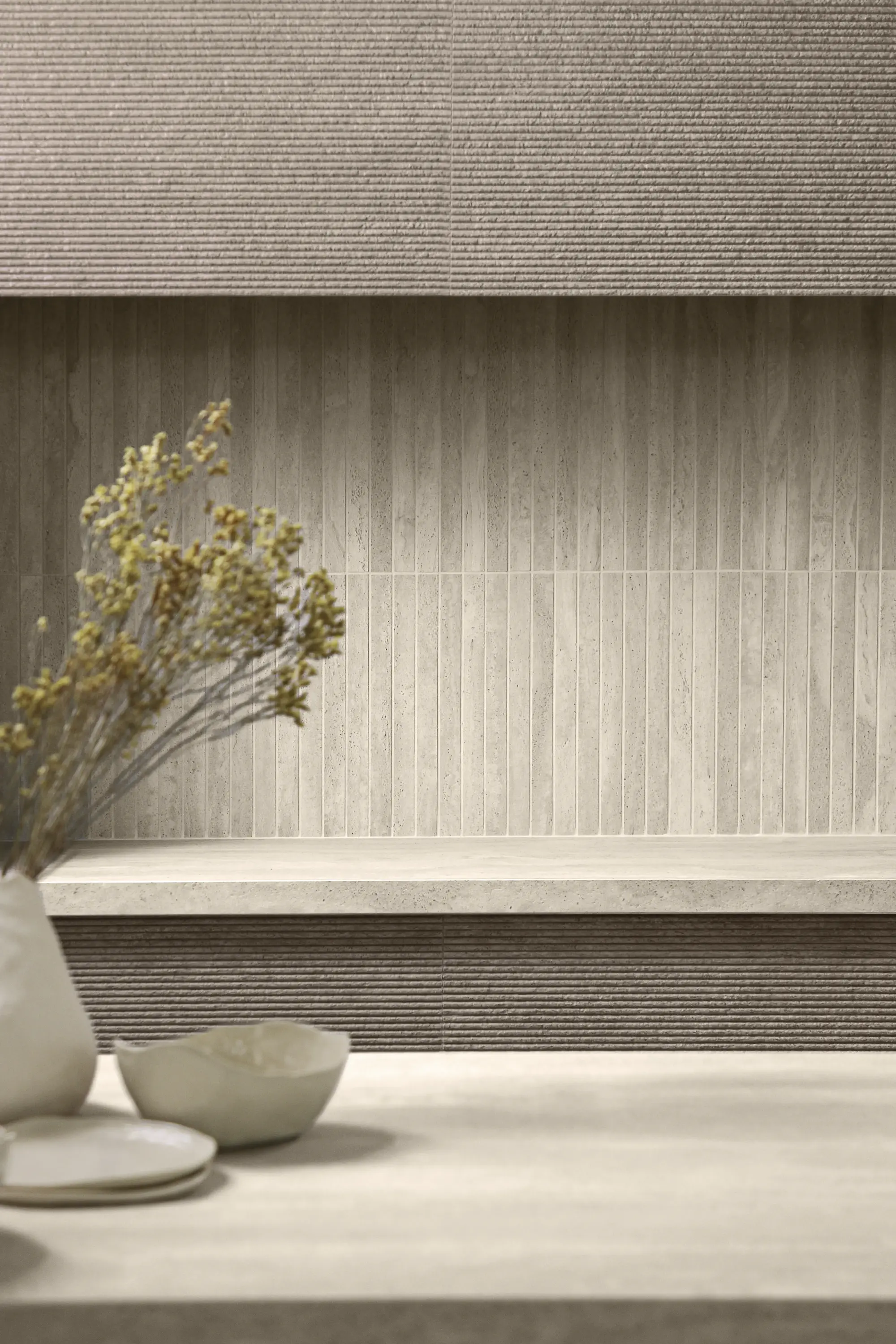 Aeterna tile wall with dried wildflowers and wooden tray on built-in bench – natural interior styling