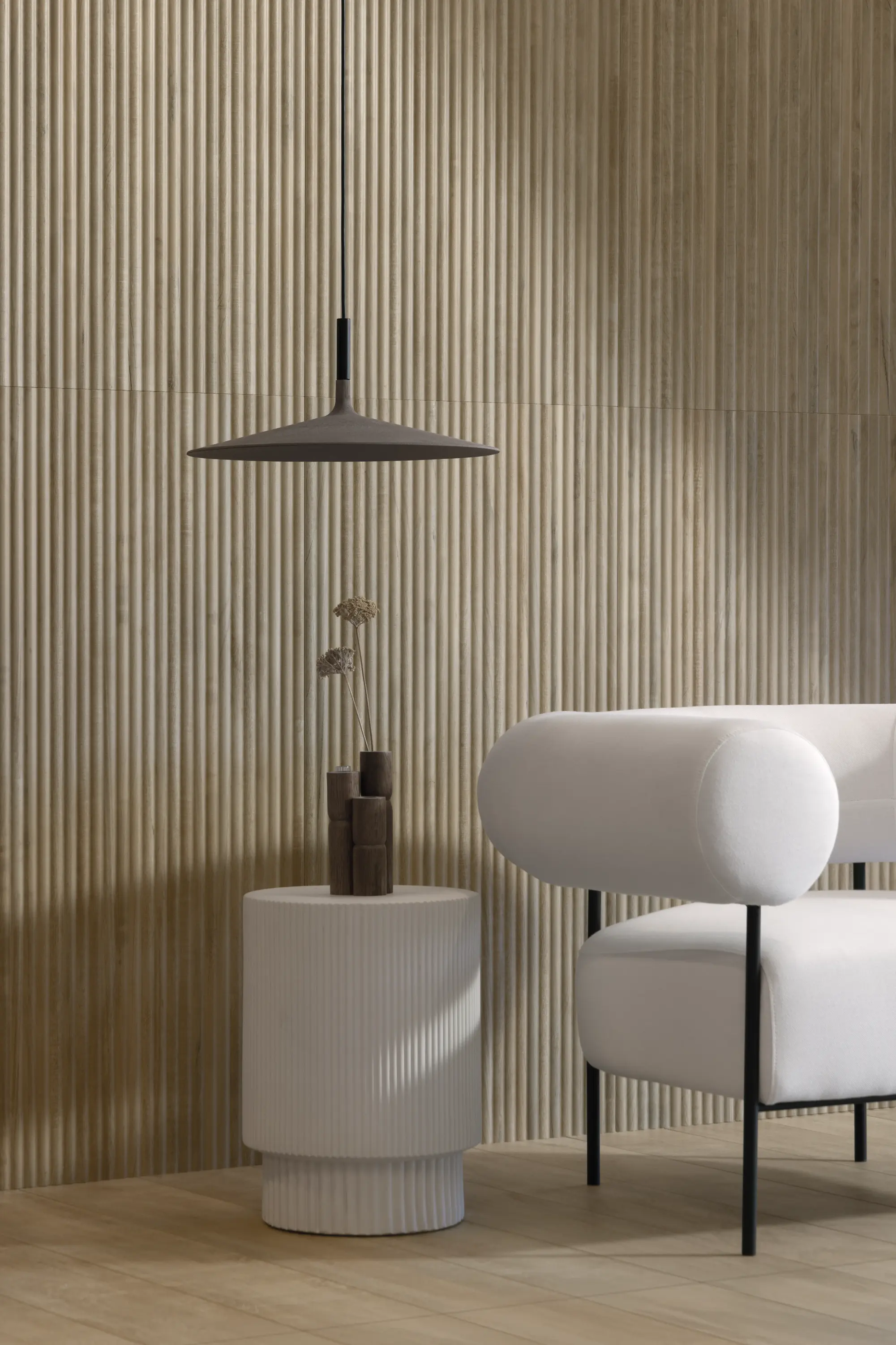 Textured wall tiles with vertical lines in a modern livingroom