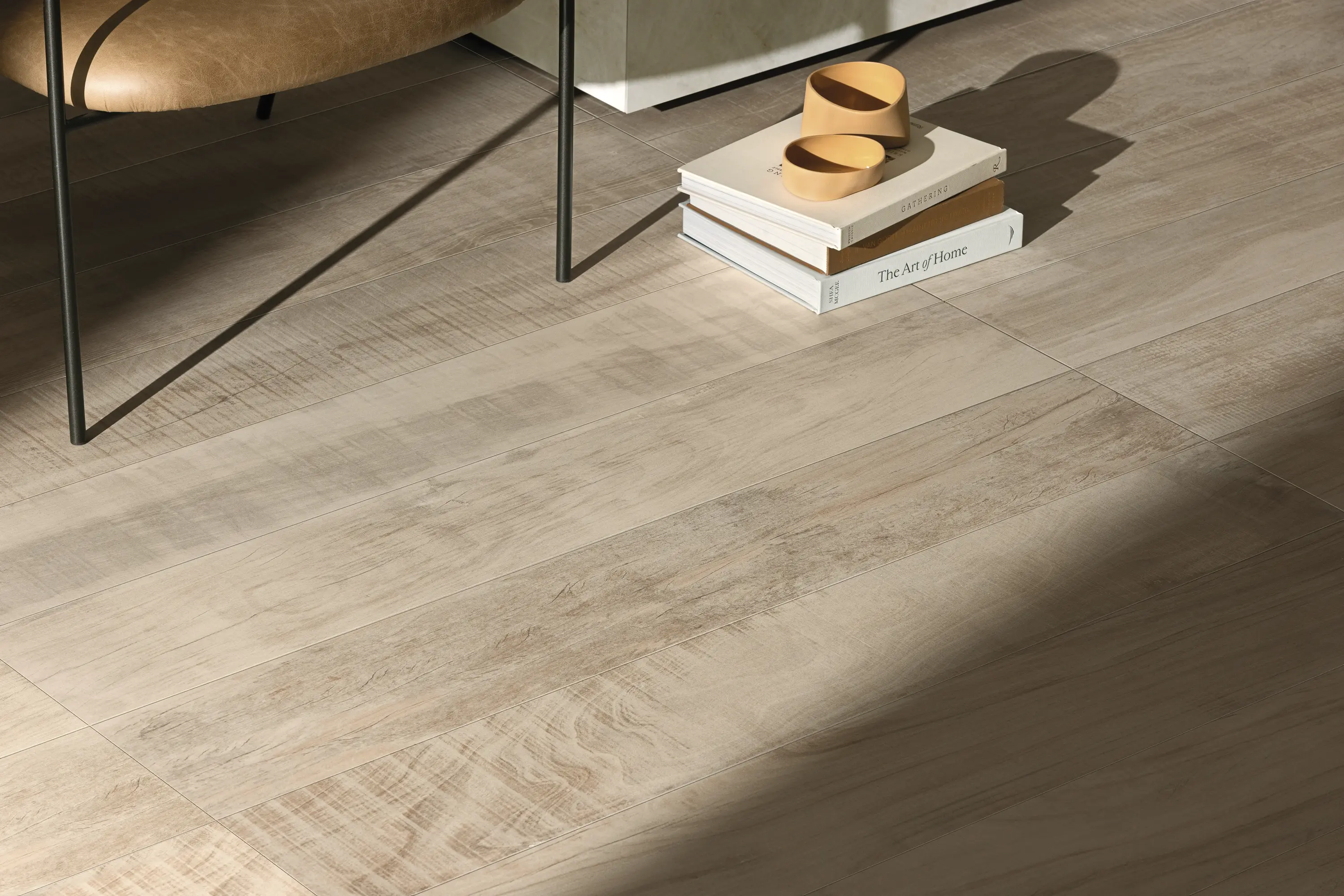 Neutral wood-look tiles with soft natural lighting