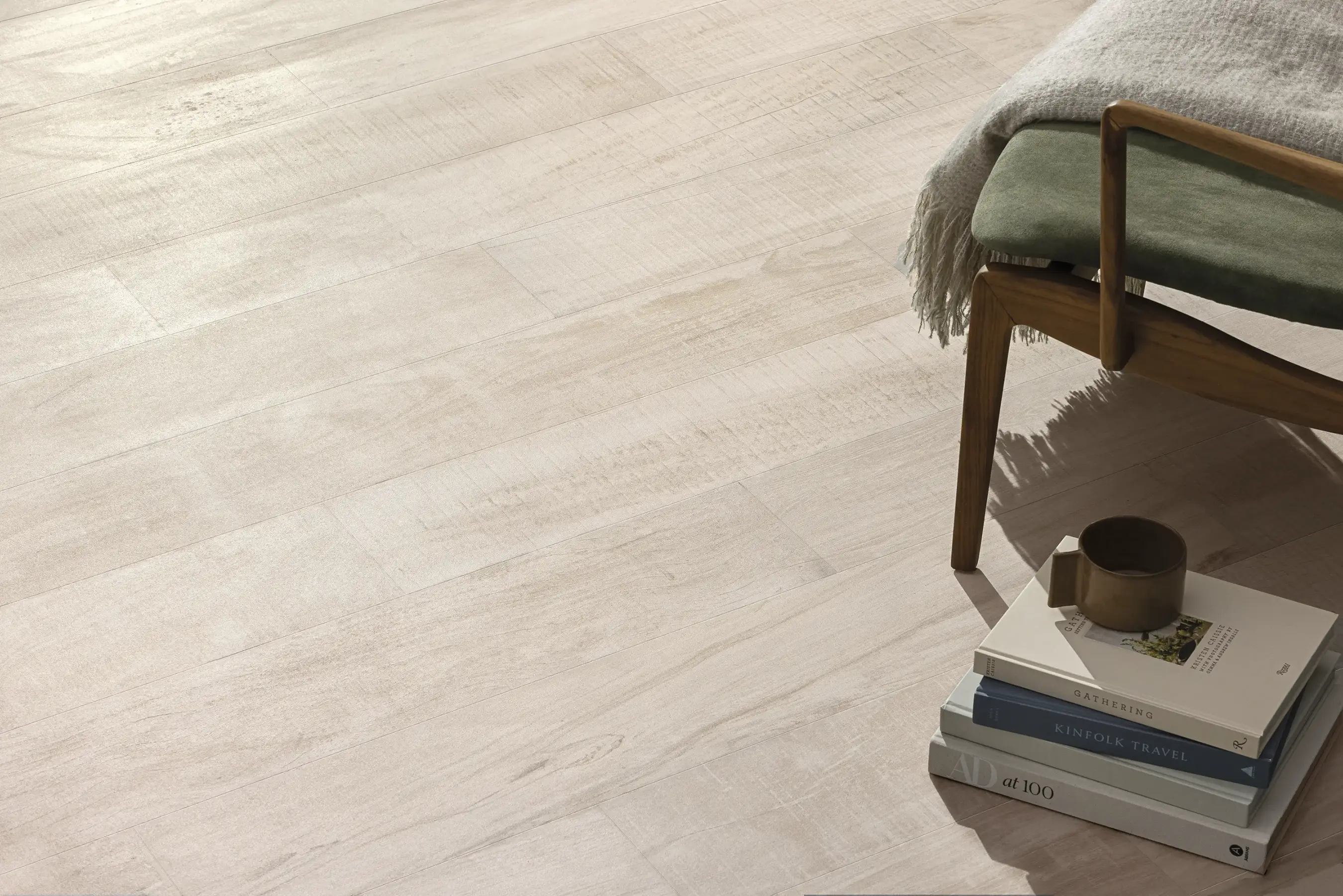 Light wood-effect floor tiles in a cozy interior setting