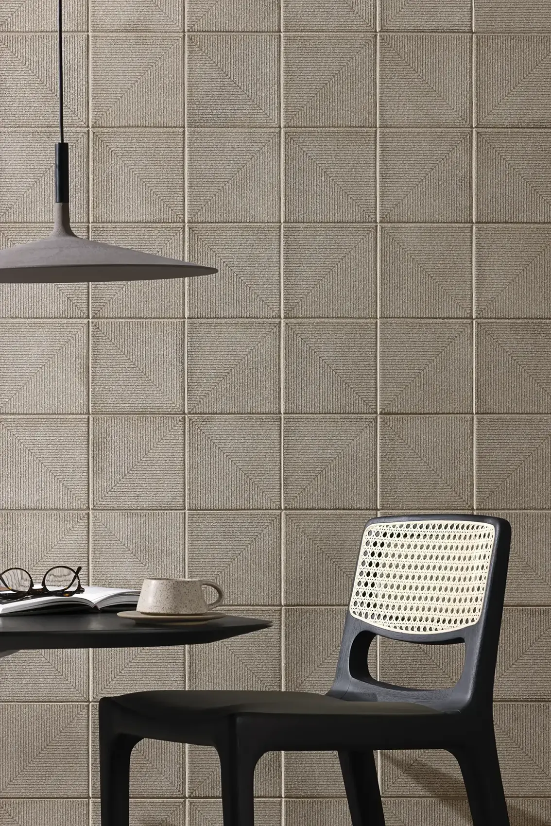 “Beige wall tiles with textured pattern in a dining space
